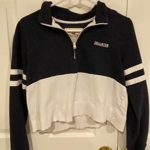 navy and white cropped zip up sweatshirt